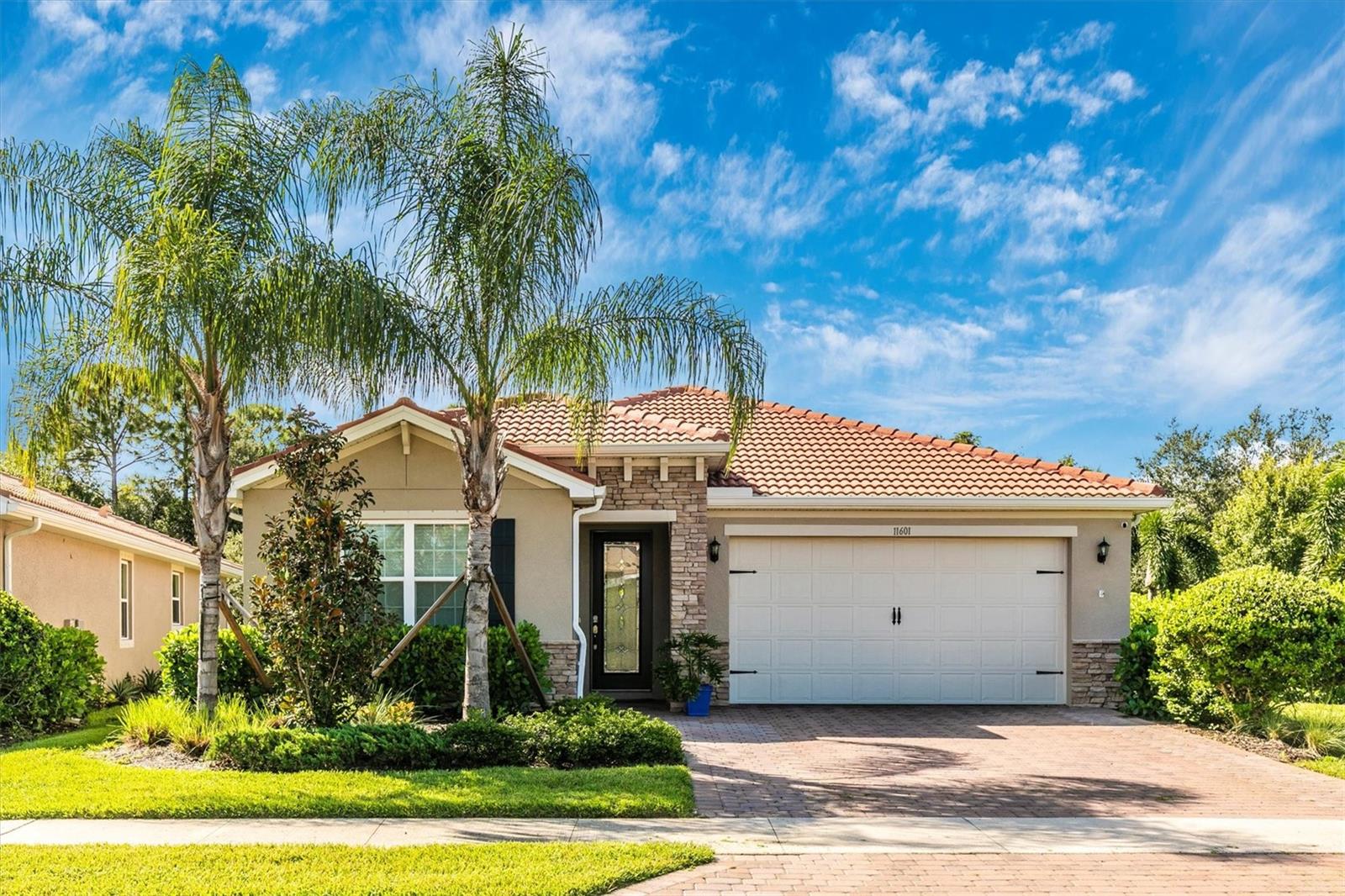 Available immediately for rent! 2 Bedroom, 2 bath plus flex room single family home in his amazing neighborhood with great amenities! Open kitchen and living room with dining area, screened in porch with. private back yard. Corner lot with all outside maintenance included in the rent. Carribean Village has beautiful community pool, clubhouse & fitness center. Home features stainless steel appliances, extra fridge in garage, granite countertops, closet organizers in walk in closets, primary suite, areat natural light throughout! Lots of storage in the home as well as 2 car garage. Call today for a private tour! Opportunity to rent to own!