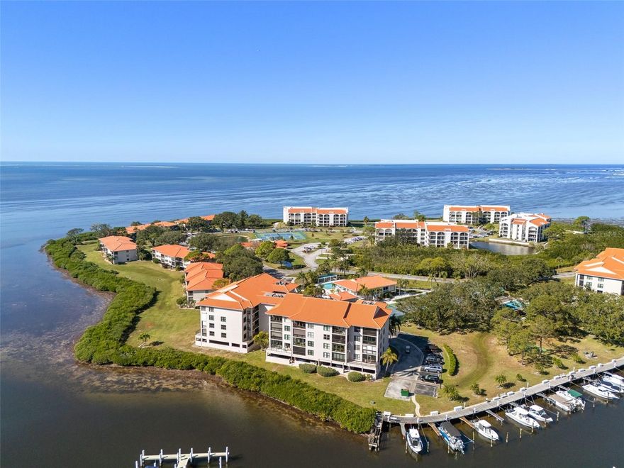 The perfect Florida second home awaits. Welcome to 1810 Mariner Dr #308 in Tarpon Cove, a private 24/7 guard-gated waterfront community designed for effortless, maintenance-free living. This residence offers stunning Gulf and marina views, creating a serene coastal retreat you’ll enjoy from the moment you arrive.
Wake up to water views from the living area, primary bedroom, and balcony—ideal for morning coffee or sunset relaxation. The home features  tile flooring throughout, fully furnished and impact windows (2025) for peace of mind while you’re away. Fully suited for seasonal enjoyment, this is a true lock-and-leave opportunity. This is also a perfect place to call home if you prefer to make this your primary residence.
Boating enthusiasts will love immediate Gulf access with  boat slip rentals available—where the marina opens directly to open water. Spend your time exploring islands, cruising at sunset, or simply unwinding along the waterfront.
Resort-style amenities include a heated pool and spa, fitness center, tennis courts, clubhouse, and scenic walking paths, with exterior maintenance included. Ideally located minutes from beaches, the Pinellas Trail, Innisbrook Golf Resort, and charming downtown Tarpon Springs. An exceptional second-home opportunity offering Gulf views, boating access, and carefree Florida living.