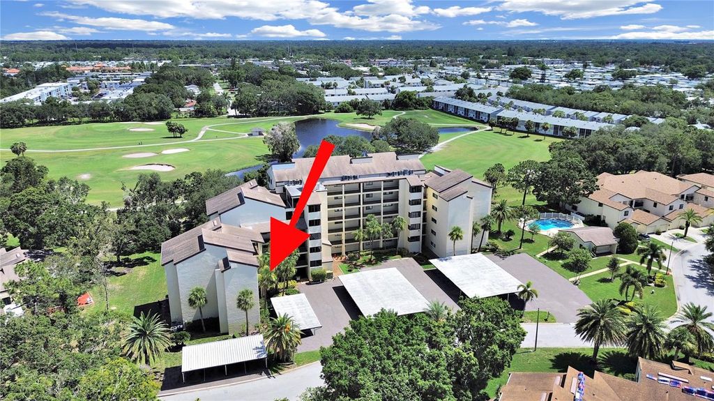 Photo of 700 Starkey Road #311, Largo, FL 33771 (MLS # TB8399159)