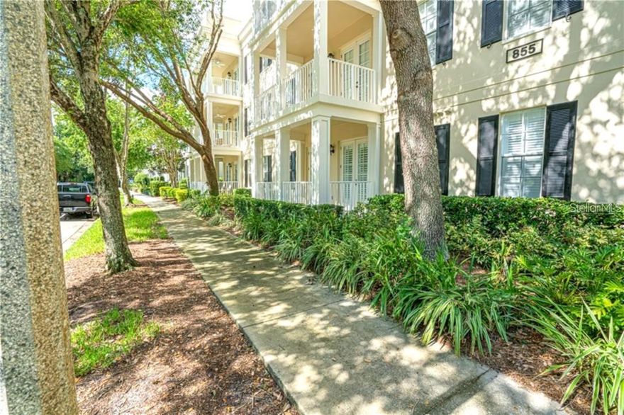 Beautiful and rarely available 3-bedroom, 2-bath first-floor condo in Celebration’s East Village with desirable east exposure and a bright, open layout. This fully updated home features stainless steel appliances, quartz kitchen countertops, marble bath surfaces, ceramic tile flooring throughout, and plantation shutters. The spacious primary suite offers a tray ceiling, walk-in closet, and ensuite bath. Enjoy a private wraparound patio with peaceful, open views. The unit faces Blue Sage St. and is just a short walk to the East Village pool, with easy access to downtown Celebration, Disney, major highways, and Orlando attractions. Includes a detached 1-car garage.