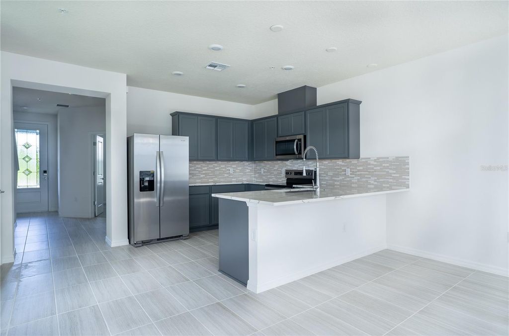 Photo of 4580 Maple Waltz Alley, Clermont, FL 34714 (MLS # O6356334)