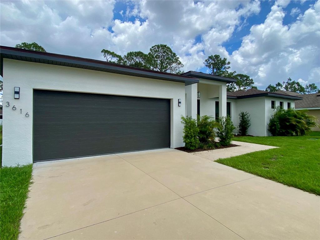 Photo of 3616 Bellefonte Avenue, North Port, FL 34286 (MLS # A4656778)