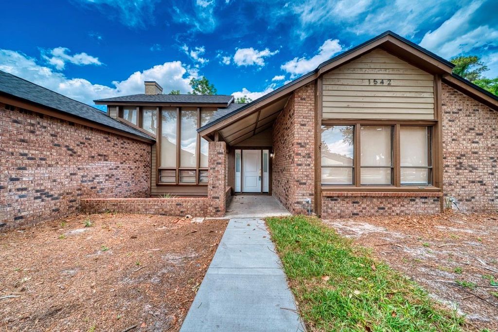 Photo of 1542 Sugarwood Circle, Winter Park, FL 32792 (MLS # S5149170)