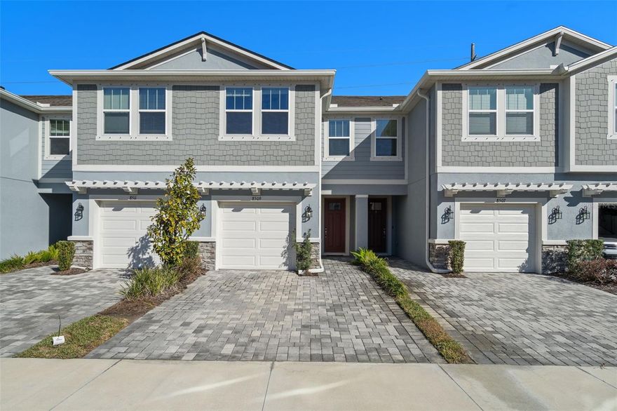 Stunning Like-New Townhome in the Heart of Odessa!
Welcome home to this beautifully maintained townhome built in 2023, located in the desirable Citron Grove community — where convenience meets modern living. Perfectly situated near top-rated schools, shopping, dining, the Veteran’s Expressway, and Tampa International Airport, this home offers both comfort and accessibility.

This immaculate residence features 3 bedrooms, 2.5 bathrooms, and a 1-car garage with gleaming epoxy floors. Step inside to discover a bright, open layout with neutral décor and upgraded tile flooring throughout the main level. The gourmet kitchen is a chef’s delight, featuring a large island with bar seating, granite countertops, white cabinetry, stainless steel appliances, and an expansive walk-in pantry. State-of-the-Art Whole home security system, water softener and you will find a flexible loft/den space upstairs with laundry convenienty located upstairs.

The open-concept design is perfect for entertaining, flowing seamlessly to the screened-in brick paver patio—ideal for relaxing and enjoying the Florida lifestyle. Upstairs, the spacious primary suite offers a true retreat, complete with a large walk-in closet, dual vanities, and a luxurious shower with upgraded tile and fixtures.

Built in 2023, everything in this home is modern, efficient, and move-in ready—leaving you nothing to do but unpack and start enjoying Odessa living.