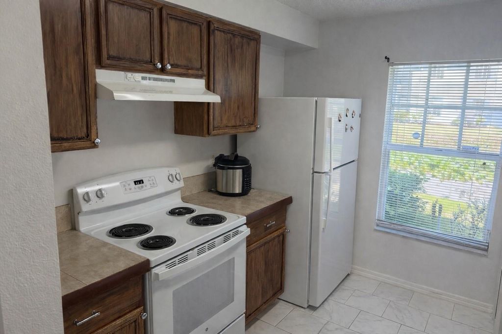 Photo of 7135 Waterside Drive, Tampa, FL 33617 (MLS # TB8483274)