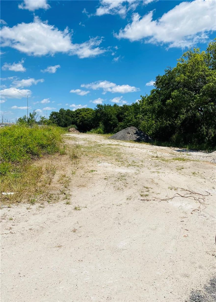 Do you want Highway exposure for your business? This property is for you.  The property includes DOT driveway, a DOT Turn lane that goes directly into the property, and a SWIFT MUD Permit that is a $15,000 Value that transfer to the new owner.  Where are you going to get two acres and HWY frontage with part of your major building expenses in place for this price. (Lot Dimensions are approximate)