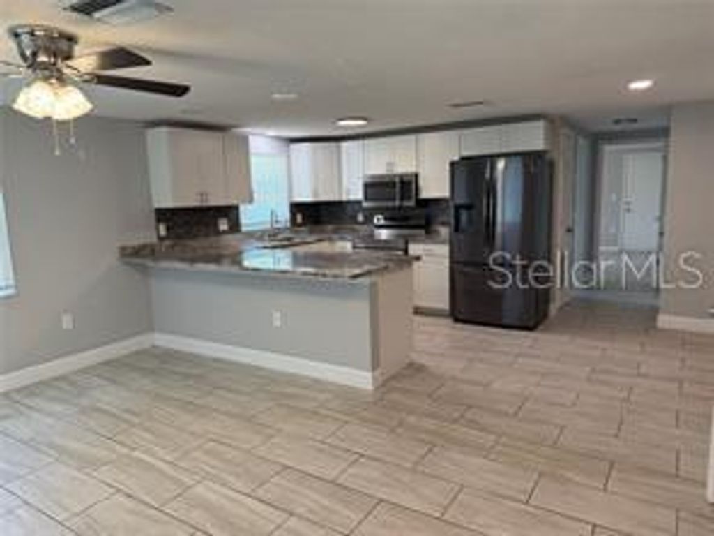Photo of 5516 9th Street, Zephyrhills, FL 33542 (MLS # TB8418460)