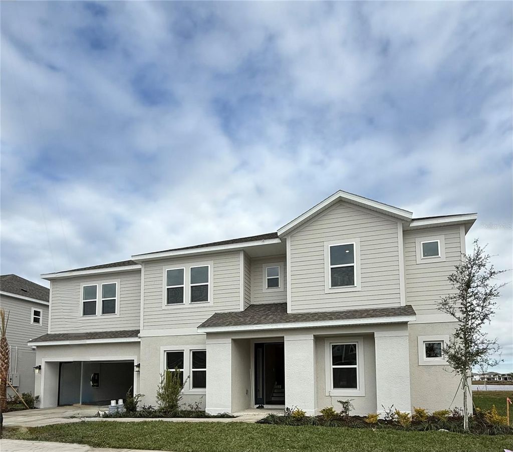 Photo of 33713 Seafarer Lane, Wesley Chapel, FL 33543 (MLS # J985140)