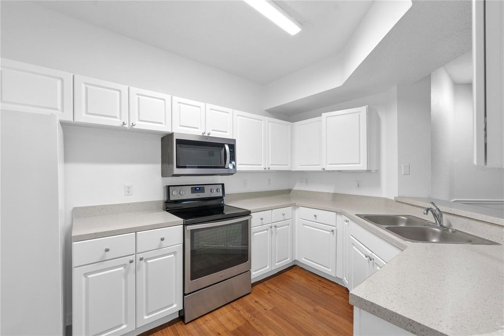 Photo of 5554 Metrowest Boulevard #203, Orlando, FL 32811 (MLS # O6381513)