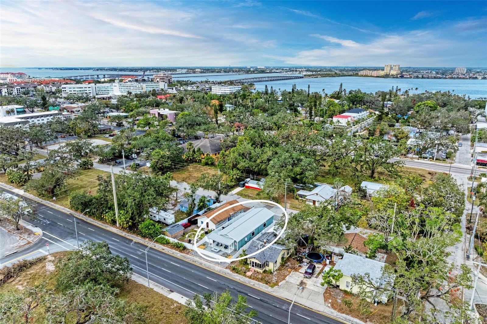 Welcome to 613 6th Avenue East, Bradenton, FL - where charm meets versatility in a pint-sized package! This property is a hidden gem for those with a keen eye for business potential, especially if you're in the shipping game. Imagine a professional studio apartment that embodies efficiency and flair in 391 square feet of thoughtfully designed space.
Step inside to discover a world where high ceilings create a sense of spaciousness. The open floor plan is drenched in natural light, thanks to it's southern exposure, making it as bright as your business prospects. This property ism't just a place to live; it's a strategic move for your shipping business and a cozy nest to call home. Dom't miss this unique opportunity in the heart of Bradenton!