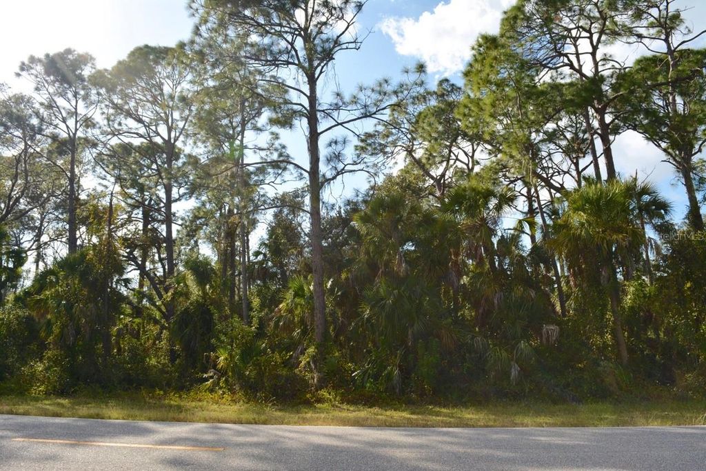 Photo of 131 Collingswood Boulevard, Port Charlotte, FL 33954 (MLS # G5091848)