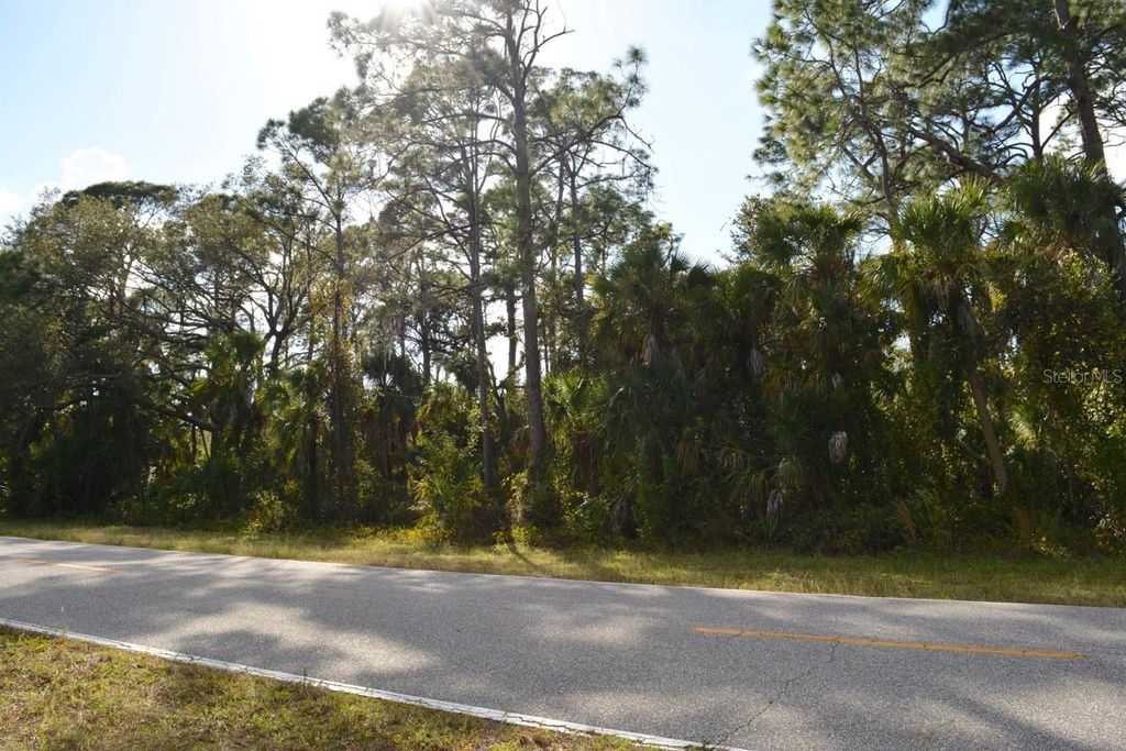Photo of 131 Collingswood Boulevard, Port Charlotte, FL 33954 (MLS # G5091848)