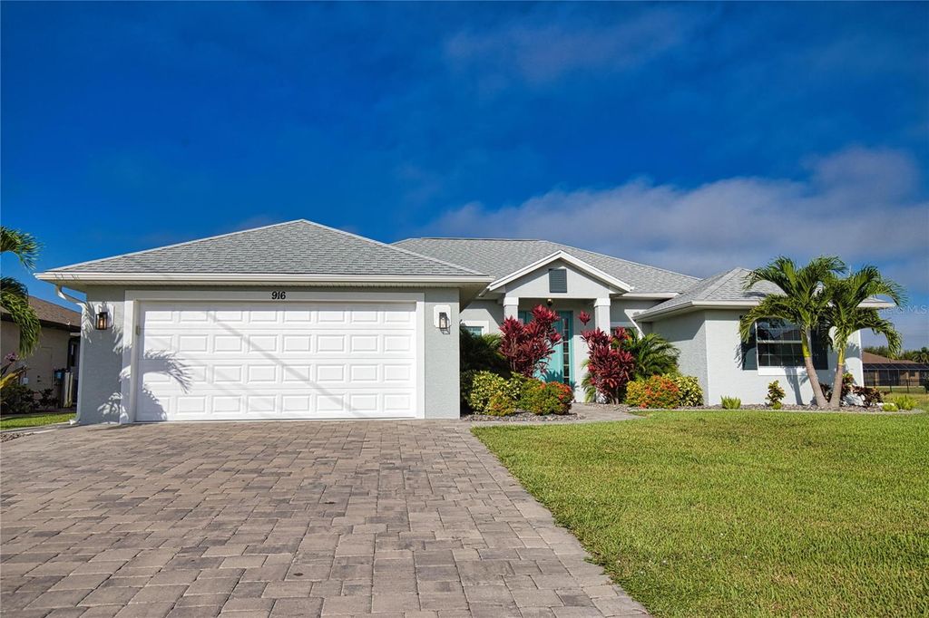 Photo of 916 Boundary Boulevard, Rotonda West, FL 33947 (MLS # O6399084)