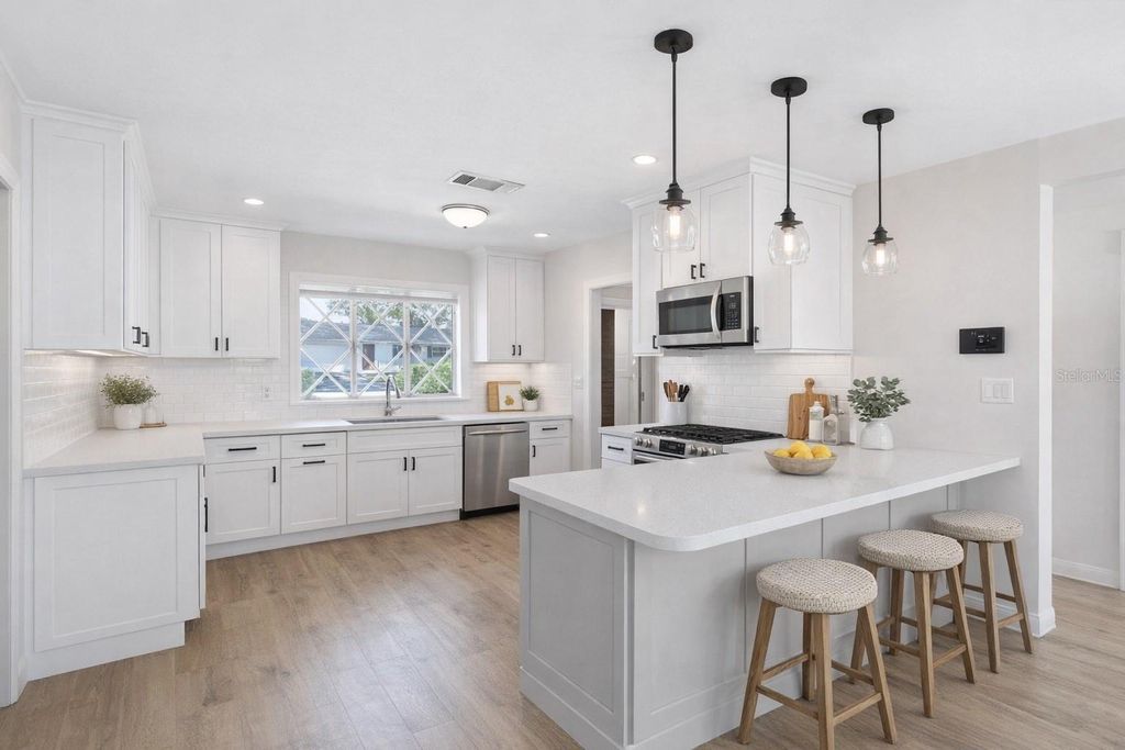 Photo of 5802 Woodbine Drive, Belle Isle, FL 32809 (MLS # O6374163)