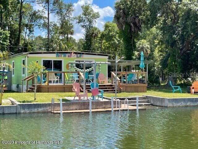 Home is active VRBO. Appointment required. Home did flood in Hurricane Helene and has been repaired. Seller has permits from the county to share. Washer and dryer do not convey.