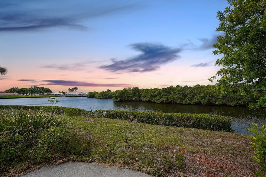 Wake up to tranquil water views in this completely remodeled (2024) 2-bedroom, 2-bath riverfront retreat offering rare seclusion with no backyard neighbors except for the dolphins. Every detail has been thoughtfully updated, including a new roof (2024), creating a move-in-ready coastal haven. The light-filled interior flows effortlessly to a glass-enclosed sunroom, the perfect place to relax and take in peaceful riverfront scenery year-round. This home delivers the ideal blend of comfort, privacy, and Florida lifestyle. Located in the highly desirable River Isles, a true hidden gem in the heart of Bradenton, residents enjoy a vibrant, active community with low HOA fees and an impressive array of amenities. Golf enthusiasts will love the private executive 9-hole course with optional membership ($620/year for unlimited play, plus $125/year for personal golf cart use). The scenic riverfront clubhouse offers a heated pool, fitness center, library, game room, shuffleboard courts, meeting spaces, and a full calendar of social activities. Cruise the neighborhood by golf cart and experience the welcoming, friendly atmosphere that makes this community so special. Unbeatable location—walk to shops, restaurants, and banks, with quick access to I-75. Just minutes to Bradenton Riverwalk, historic downtown, the Village of the Arts, UTC Mall, Ellenton Outlets, St. Armands Circle, and the world-renowned Gulf beaches with breathtaking sunsets. Live the Florida lifestyle—your riverfront paradise awaits.