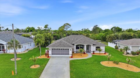 Photo of 828 Rotonda Circle, Rotonda West, FL 33947 (MLS # D6146943)