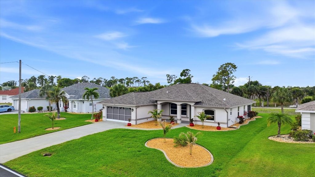 Photo of 828 Rotonda Circle, Rotonda West, FL 33947 (MLS # D6146943)