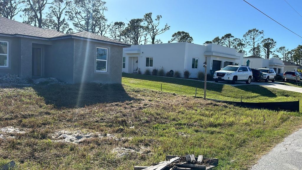 Photo of 12047 Henley Avenue, Port Charlotte, FL 33981 (MLS # TB8429237)