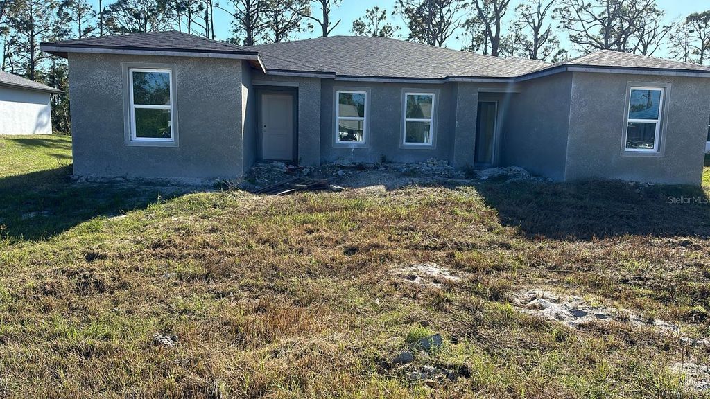Photo of 12047 Henley Avenue, Port Charlotte, FL 33981 (MLS # TB8429237)