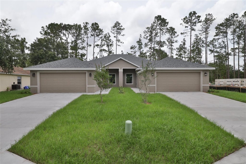 Photo of 51 Providence Lane #A, B, Palm Coast, FL 32164 (MLS # FC321745)