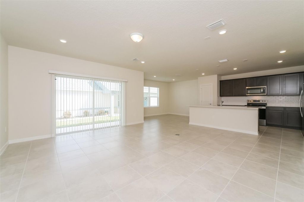 Photo of 3293 Ellsworth Avenue, Davenport, FL 33837 (MLS # O6393582)