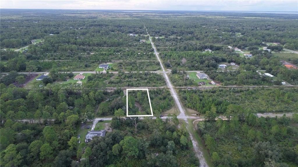 Photo of Magnolia Dr, Indian Lake Estates, FL 33855 (MLS # O6442645)