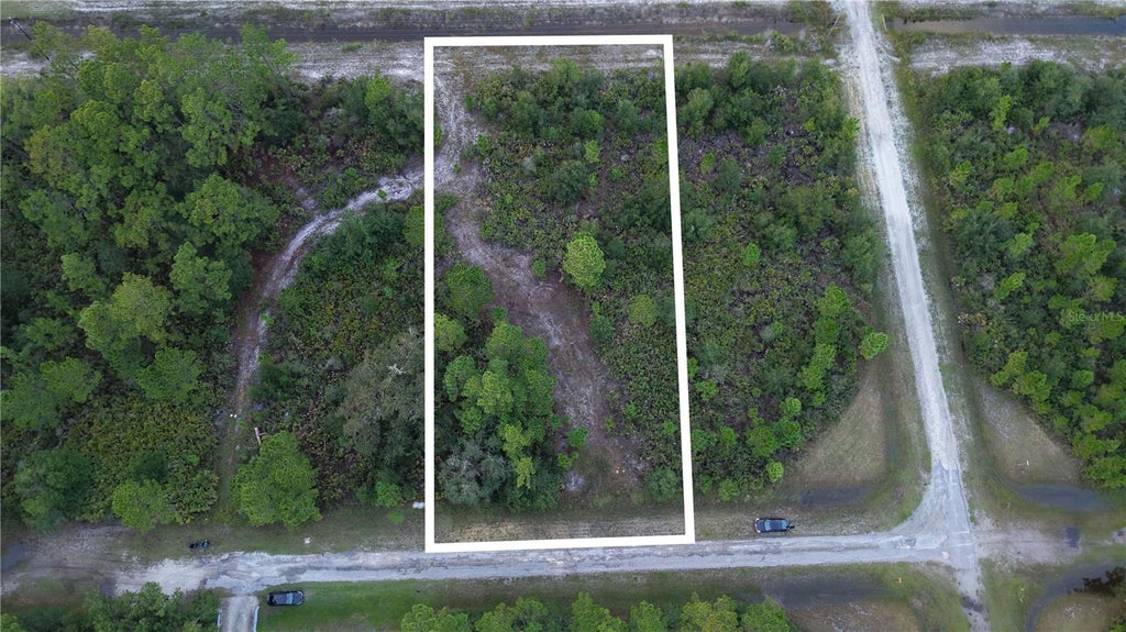 Photo of Magnolia Dr, Indian Lake Estates, FL 33855 (MLS # O6442645)