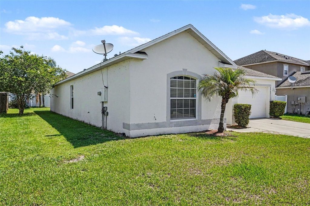 Photo of 1761 Eagle Pines Circle, Eagle Lake, FL 33839 (MLS # O6416318)