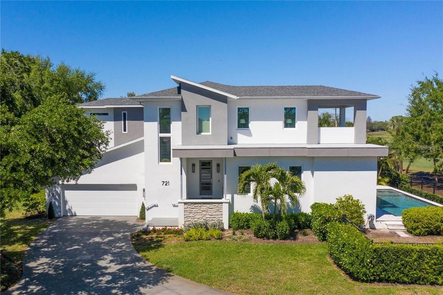 Worry-Free Living awaits you in this Modern Masterpiece! Full house, automatic-switched generator, 3-story elevator, Moen Flo automatic water shut-off, block construction, hurricane windows and doors-every aspect of this house is designed to offer the new owner a living experience that is both hassle-free and enveloped in luxury. This modern home is in the highly sought-after neighborhood of Snell Isle with 280' of frontage on the prestigious Vinoy Golf course. Step into the comfort and luxury with new large profile porcelain floors gracing the entire first floor and lanai, transitioning to elegant white oak floors on the second level, setting a warm, inviting tone throughout the home. Treat yourself to the newly redesigned gourmet kitchen with a large island, quartzite countertops and backsplash that is equipped with the state-of-the-art appliances including full size Subzero refrigerator and freezer, Wolf convention oven, speed oven and warming drawer and the top of the line Thermador Freedom induction cooktop. (For cooks who prefer gas cooking, there is a capped gas connection). The custom bar area, boasting Subzero refrigerator and freezer drawers, stands ready to host your refined gatherings. In addition to the walk-in pantry, there is a large Butler's pantry-perfect for catering, and is also set up as a first floor office. Find effortless flow in the open floor plan where entertainment meets sophistication. The dining space and great room are in the heart of this home, located conveniently near the kitchen and outdoor covered lanai, offering seamless indoor-outdoor living. The covered lanai overlooks the heated pool and spa and the beautiful, tranquil view of the golf course. The lanai can accommodate a table for 10, chaise lounges and television. For outside grilling, there is a large gas grill, cooktop and double sink. A 3-story custom elevator connects every level of the home, including the air-conditioned garage, ensuring easy movement throughout the haven. The garage has two dedicated electrical vehicle charging connections and is large enough for two vehicles and a golf cart. The primary ensuite not only promises plush living but also opens up to breathtaking views from a private covered balcony overlooking the golf courses and downtown area. Two new 18 SEER AC systems were installed in 2022, both with Air Knight purifiers, ensuring the cleanest air quality in every corner of your home. The other two bedrooms are ensuite. The spacious laundry room is located on the second level for the owner's convenience. Transition smoothly from the stylish interiors to the splendid outdoor living space. In addition to the pool and hot tub, there is a lovely side lawn surrounded by shrubs, perfect for a playground, bocce court or a putting green. Every detail has been meticulously considered for a life of convenience and peace of mind. This home is ready to met the demands of a modern lifestyle while promising easy and elegant living. Join us in experiencing the comfort, the luxury, and the peace of mind with this modern masterpiece!