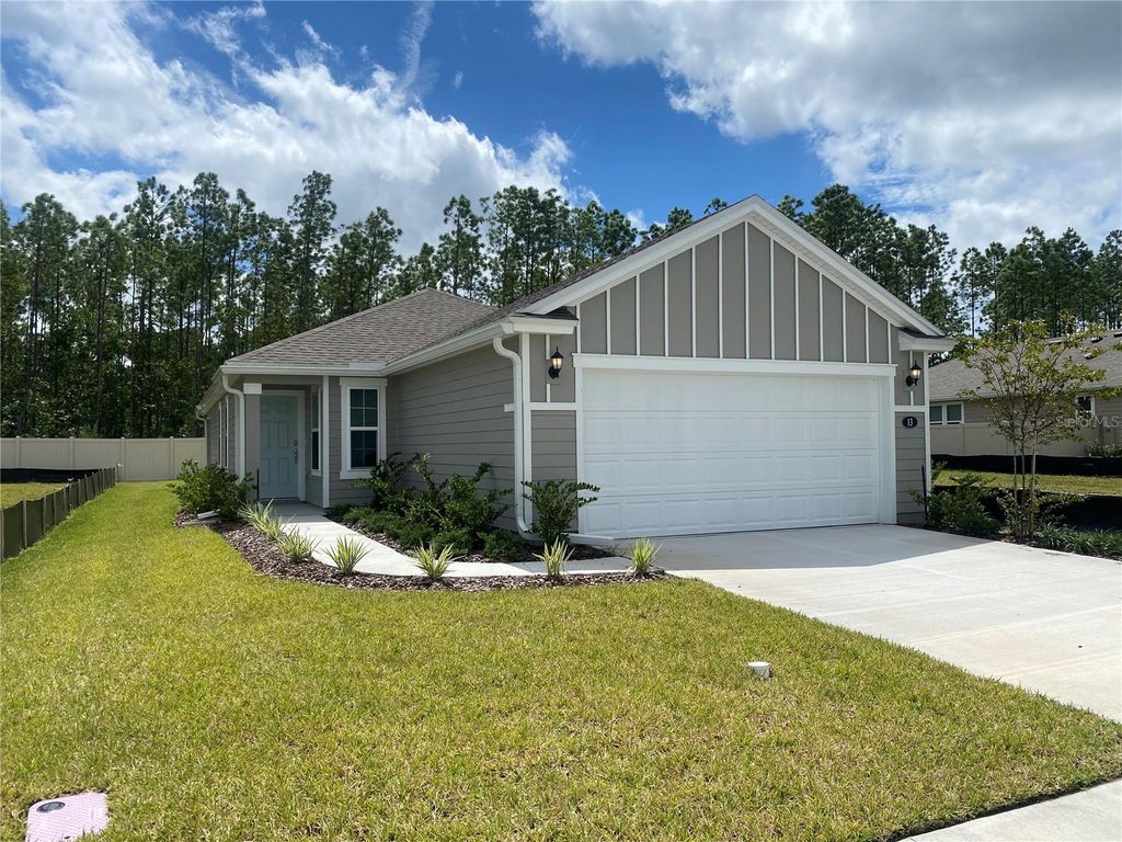 Photo of 13 Tea Olive Drive, Palm Coast, FL 32137 (MLS # FC312498)