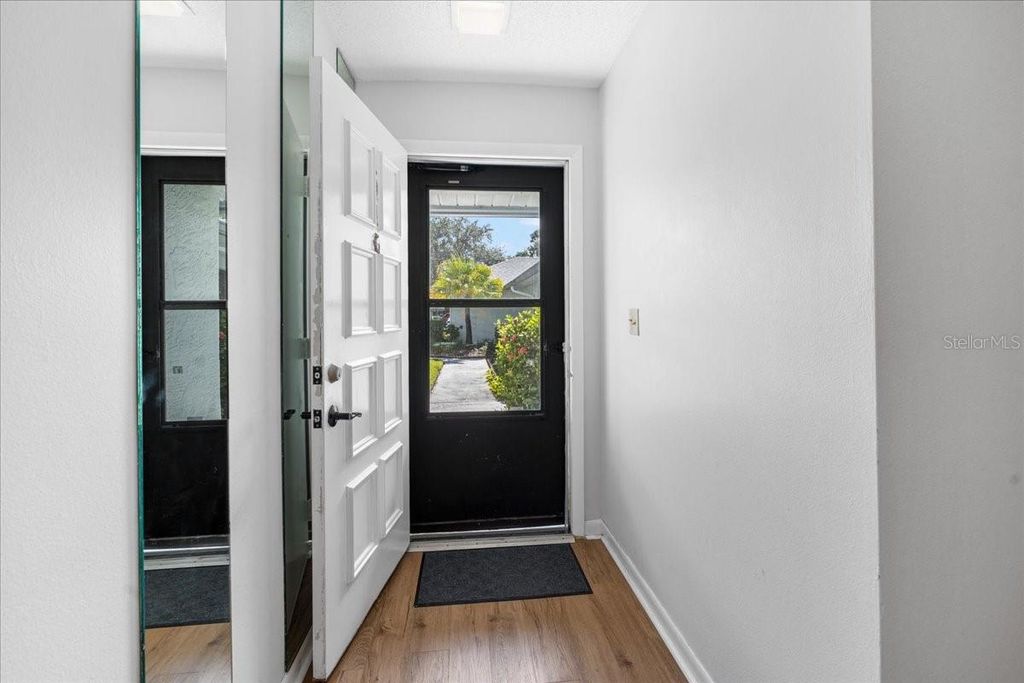 Photo of 2765 Countryside Boulevard #104, Clearwater, FL 33761 (MLS # TB8446936)