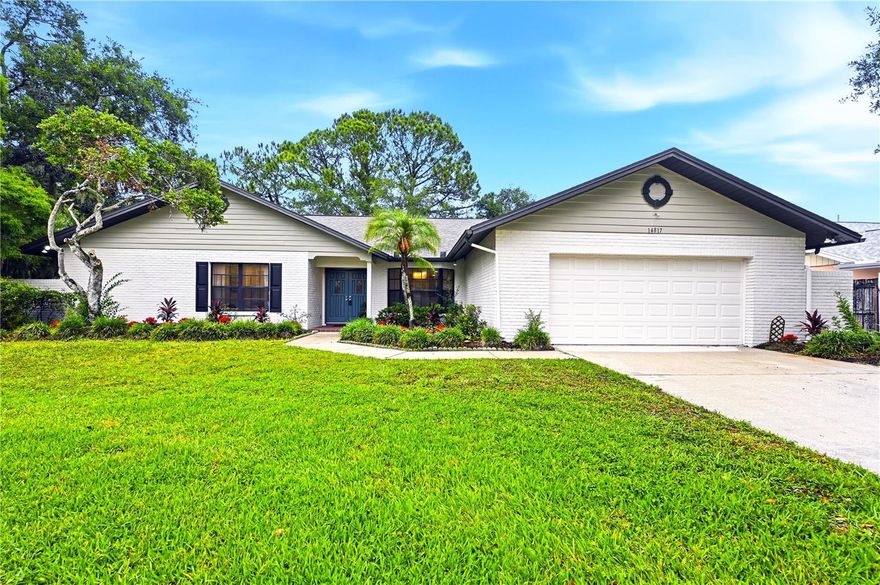 WOW FACTOR ALERT — COMPLETELY RENOVATED CARROLLWOOD VILLAGE POOL HOME PRICED WELL BELOW COMPARABLE PROPERTIES! This designer-inspired residence has been fully transformed with sophisticated modern finishes and elevated style throughout. From the moment you enter, you’ll notice the bright, open feel enhanced by brand-new luxury vinyl flooring, recessed lighting, fresh interior and exterior paint, and curated designer fixtures that create a sleek, contemporary aesthetic.

The stunning primary suite feels like a private spa retreat, featuring a beautifully redesigned bathroom with a luxurious walk-in shower, new vanities, and upscale finishes that deliver a true resort-style experience at home. Every detail has been thoughtfully updated to blend comfort, function, and modern elegance.

Designed for both entertaining and everyday living, the flexible floorplan offers exceptional versatility for families, guests, remote work, or multi-generational living. Walls of natural light lead to your own private outdoor oasis complete with a massive sparkling pool, expansive patio, oversized fenced backyard, and a rare dedicated outdoor bathroom — the ultimate setup for seamless Florida living and unforgettable gatherings.

Additional peace of mind comes with a BRAND-NEW 2025 ROOF, making this home as practical as it is beautiful.

Located in highly desirable Carrollwood Village, residents enjoy access to playgrounds, tennis courts, basketball courts, parks, and walking trails, all while being minutes from Tampa International Airport, major interstates, premier dining, shopping, and world-famous Gulf Coast beaches.

Luxury. Style. Value. Opportunity. Homes with this level of renovation and design at this price point are exceptionally rare. Schedule your private showing today before it’s gone.