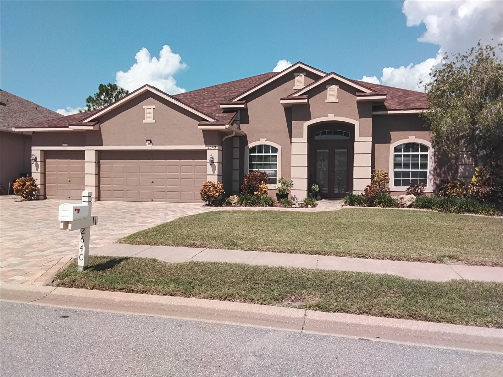 Welcome to this stunning,meticulously maintained home located in the highly desirable gated community of Key Vista.The home sits approximately 15 ft. above sea level and seller is not aware of any major storm damage or flooding within the community,ever.Only minutes from the beautiful Gulf beaches,Anclote River Park,and the brand-new Coastal Anclote Trail,this property offers the perfect blend of space,comfort, and luxury.Owner financing avail. w/ 30% down.Home Ins. $1689 yrly.This spacious residence features 4 bedrooms,3 full bathrooms,3-car garage,a private office(5th bedroom it has a closet)and a large second-floor bonus room with a walk-in closet—ideal as a 6th bedroom,game room, home theater,or man cave.The owners have lovingly cared for this home.From the moment you enter through the grand 8-ft. glass double doors,you’re welcomed by a mosaic tile inlay,a custom chandelier, and elegant recessed ceilings with wood inlay.The open-concept floor plan boasts a large kitchen overlooking the living room,perfect for entertaining.The kitchen is equipped with upgraded granite countertops, a stylish backsplash,and 42-inch wood(gray) cabinets with crown molding.Stainless steel appliances,pendant lighting over the breakfast bar,and LED lights throughout add to the home’s modern appeal.Floors are finished with 18-inch tile throughout the main living areas and new wood laminate in the bedrooms except master is tile.Additional features include 5 ¼-inch baseboards and crown molding in the primary living spaces,along with custom wood trim framing in the family room windows and all doors including the sliders.The office features wood-look tile and a tray ceiling with crown and wood inlay, mirroring the detailing found in the expansive primary bedroom w/ all new tile floor.The master suite offers a peaceful retreat with its tray ceilings w/wood inlay, crown molding, and a luxurious, fully remodeled en-suite bathroom.Highlights include a seamless glass walk-in shower,floor-to-ceiling tile,a large soaking garden tub,and granite countertops atop upgraded wood(coffee) cabinetry.Both additional bathrooms have also been fully remodeled with the same attention to quality and detail including shower tile to the ceilings.Over 2,500 square feet of pavers extend from the driveway to the side yard and into the backyard patio area.The extended patio is already fitted with footers,ready for a screened enclosure or gazebo addition.Enjoy Florida evenings with a fully equipped outdoor kitchen featuring a grill and refrigerator or gather around the custom fire pit surrounded by creek rock.The backyard overlooks a peaceful open field with no rear neighbors and is just a short walk to the community clubhouse and heated pool.The upstairs bonus room,currently used as a game room,includes a built-in bar, chair rail molding, wood-look tile flooring, and crown molding,offering a versatile space for entertainment or relaxation.Other notable features include two A/C systems with germicidal UV lights,a widened driveway,and concrete curbing throughout the front and backyard landscaping.Key Vista is a vibrant, amenity-rich community with a full clubhouse,heated pool and spa,fitness center,tennis and volleyball courts,playground,and access to nearby nature trails and the Holiday Recreation Center.Just outside the back gate, you'll find the intercoastal waterway leading to the Gulf of Mexico—ideal for outdoor lovers and boaters.Owner financing avail. w/ 30% down.Home Ins. $1689 yrly
