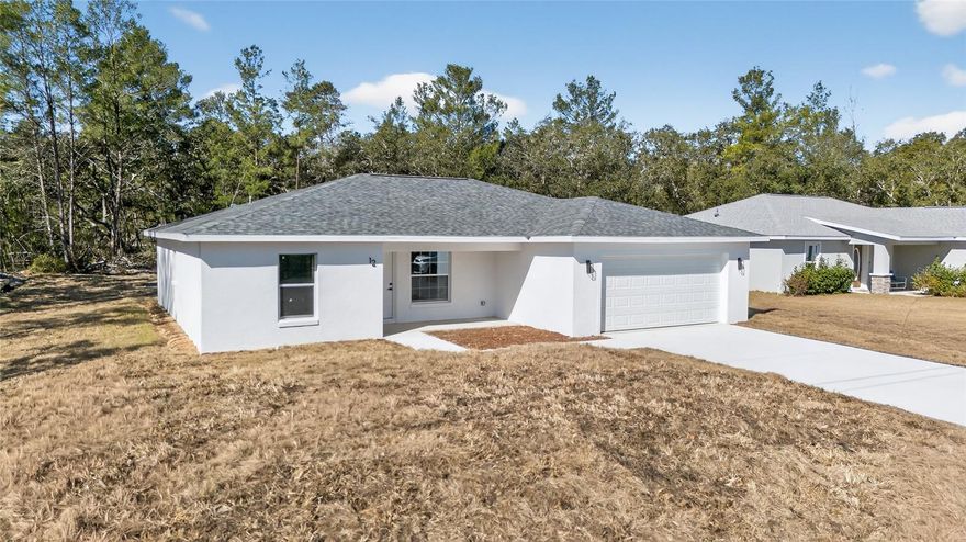 Under Construction. Almost ready! Beautiful 3-bedroom, 2-bathroom home in Ocklawaha featuring an open-concept floor plan, sterling steel appliances, quartz counter tops in the kitchen, and in the bathrooms. Laminated floors throughout the house. This home offers a warm, functional layout with a cozy feel and modern finish. Spacious backyard with a covered porch. One which offers plenty of room for a future swimming pool, a shed, or having a summer kitchen. There is no HOA and the home is in a quiet neighborhood close to Lake Weir. A place where you can enjoy boating, jet skiing, and kayaking. Not to mention shopping, restaurants, and main highways being less than 20 minutes away. It is an excellent choice to serve as a primary residence or as an investment property. It is a MUST SEE!!