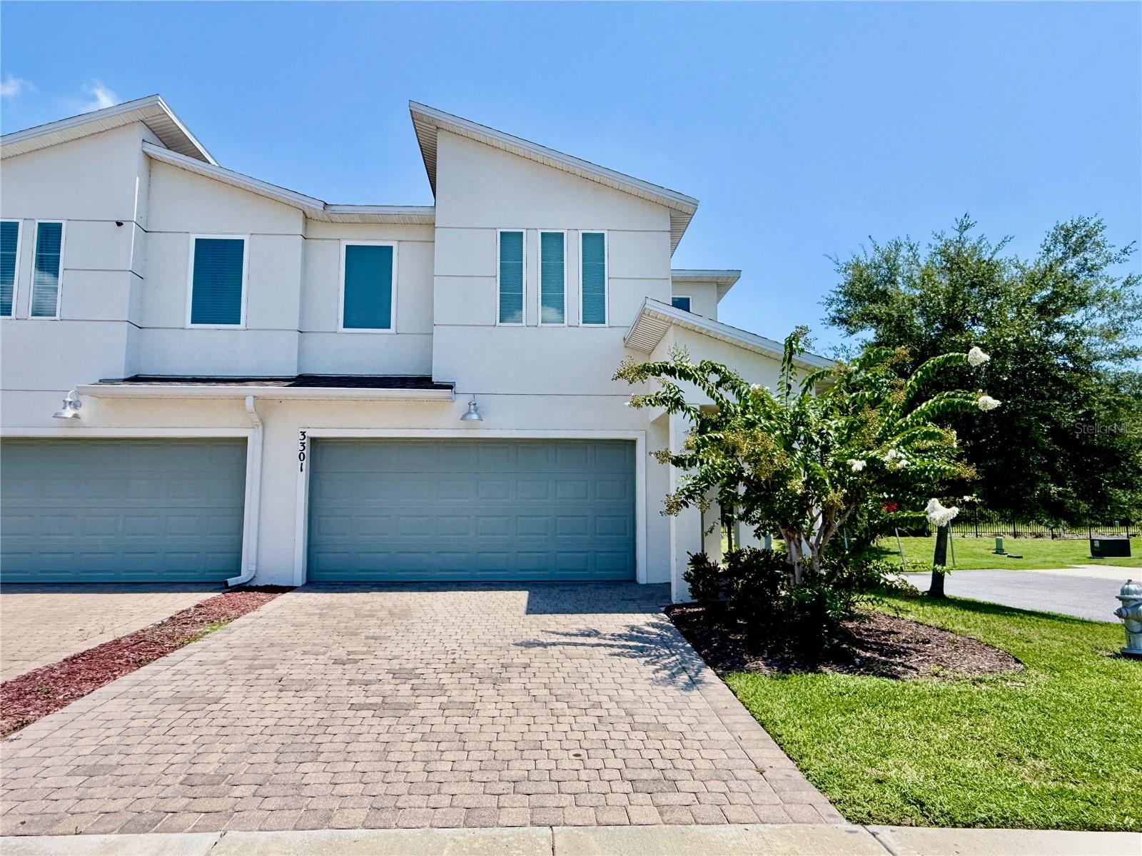 Welcome to this beautifully maintained home in the desirable Bella Parc gated community of Kissimmee! This spacious residence offers a bright, open-concept layout with modern finishes throughout. The kitchen features sleek cabinetry, granite countertops, stainless steel appliances, and a large island perfect for entertaining. Enjoy a generously sized primary suite with a walk-in closet and a spa-inspired bathroom. This property offers a full bathroom and bedroom on the first floor for convenience. Outside, relax on the covered patio overlooking a landscaped yard. Conveniently located near Valencia, shopping, dining, schools, and major roadways, this home combines style, comfort, and accessibility