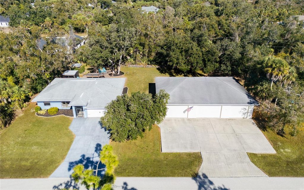 Photo of 16376 Chicopee Avenue, Port Charlotte, FL 33954 (MLS # TB8465001)