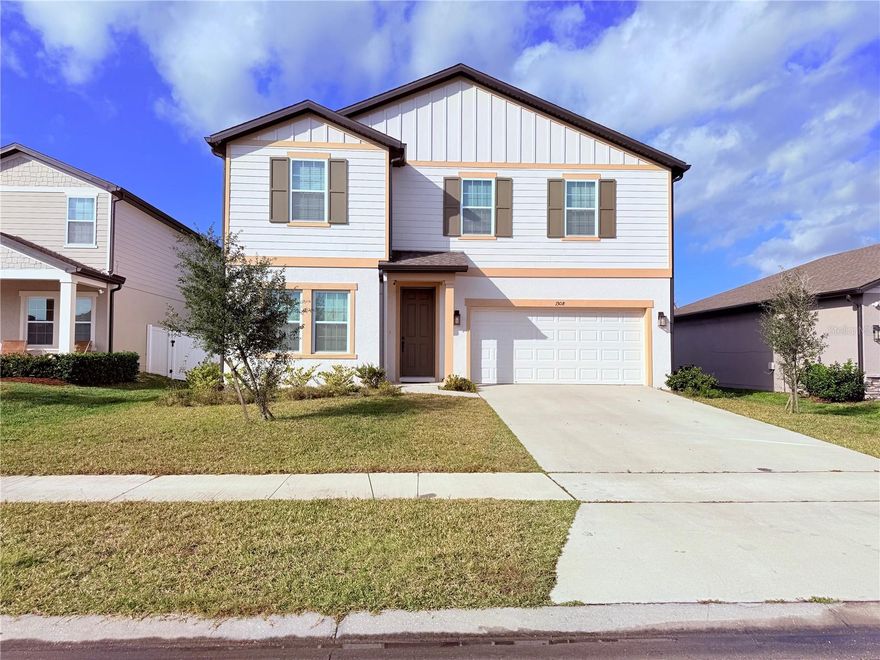 Like a sunflower that turns toward the sun, this beautiful home welcomes each day with warmth, light, and positive energy. This newer construction offers 4 bedrooms, 2.5 bathrooms, and 2,402 square feet of thoughtfully designed living space, blending comfort, functionality, and modern style. The open-concept first floor is perfect for gathering and everyday living, with a spacious kitchen flowing seamlessly into the main living areas. All bedrooms are located upstairs and an extra room in the first floor also including a serene primary suite that serves as a peaceful retreat at the end of the day, along with an additional room on the first floor. Enjoy a 2-car garage, modern finishes, and a manageable lot ideal for low-maintenance living. Situated in a welcoming Deltona community with sidewalks and a playground, conveniently close to shopping, dining, schools, and major roadways. This Beauty includes a permanently installed stair lift, providing added accessibility to the second floor.