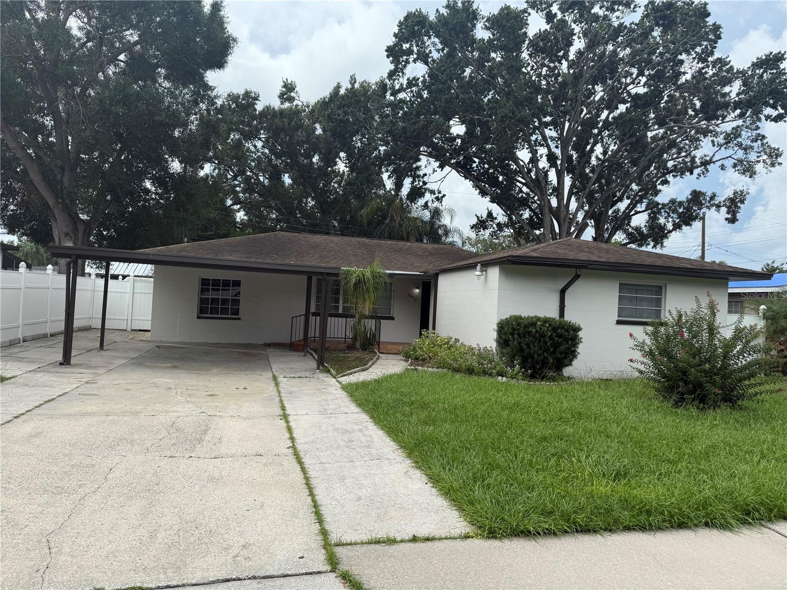 Welcome to Beautifully Renovated 4BD/2.5BA! Discover the perfect blend of Tampa charm and modern convenience in this beautifully updated single-family home. Centrally located, including top-notch shopping, dining, entertainment, and essential services. Key Features: Prime Location: Minutes from major malls, restaurants, interstate access, Tampa International Airport, and renowned hospitals. Solid Construction: Built in 1959, this home boasts durable block construction, ensuring longevity and low maintenance. Recent Updates: Freshly painted with new flooring and modern kitchen appliances, providing a contemporary feel while retaining its mid-century character. Spacious Living: With over 2,000 square feet, this home offers ample space for comfortable living. It includes 4 bedrooms and 1.5 bathrooms, perfect for families of all sizes. Expansive Lot: Situated on a generous 0.18-acre lot, the property features a fenced-in backyard, ideal for outdoor activities and privacy. Outdoor Enjoyment: Enjoy the Florida sunshine in your backyard, complete with a mature mango tree that adds a touch of nature and a delicious seasonal treat. Proximity to Recreation: Just a short walk to Al Lopez Park, providing a green oasis for relaxation and recreation. Only 1 mile north of Raymond James Stadium, perfect for sports enthusiasts. This home is a rare find, offering the best of Tampa living. Whether you're looking for a serene retreat or a vibrant lifestyle, this property is the ideal place to call home. Don't miss the opportunity to own a piece of Tampa's history with all the modern updates you desire. Schedule your private tour today and experience the charm and convenience of this exceptional home! Roof 2011 | A/C 2018 | Floors, Paint 2024 | Kitchen Appliances 2024.