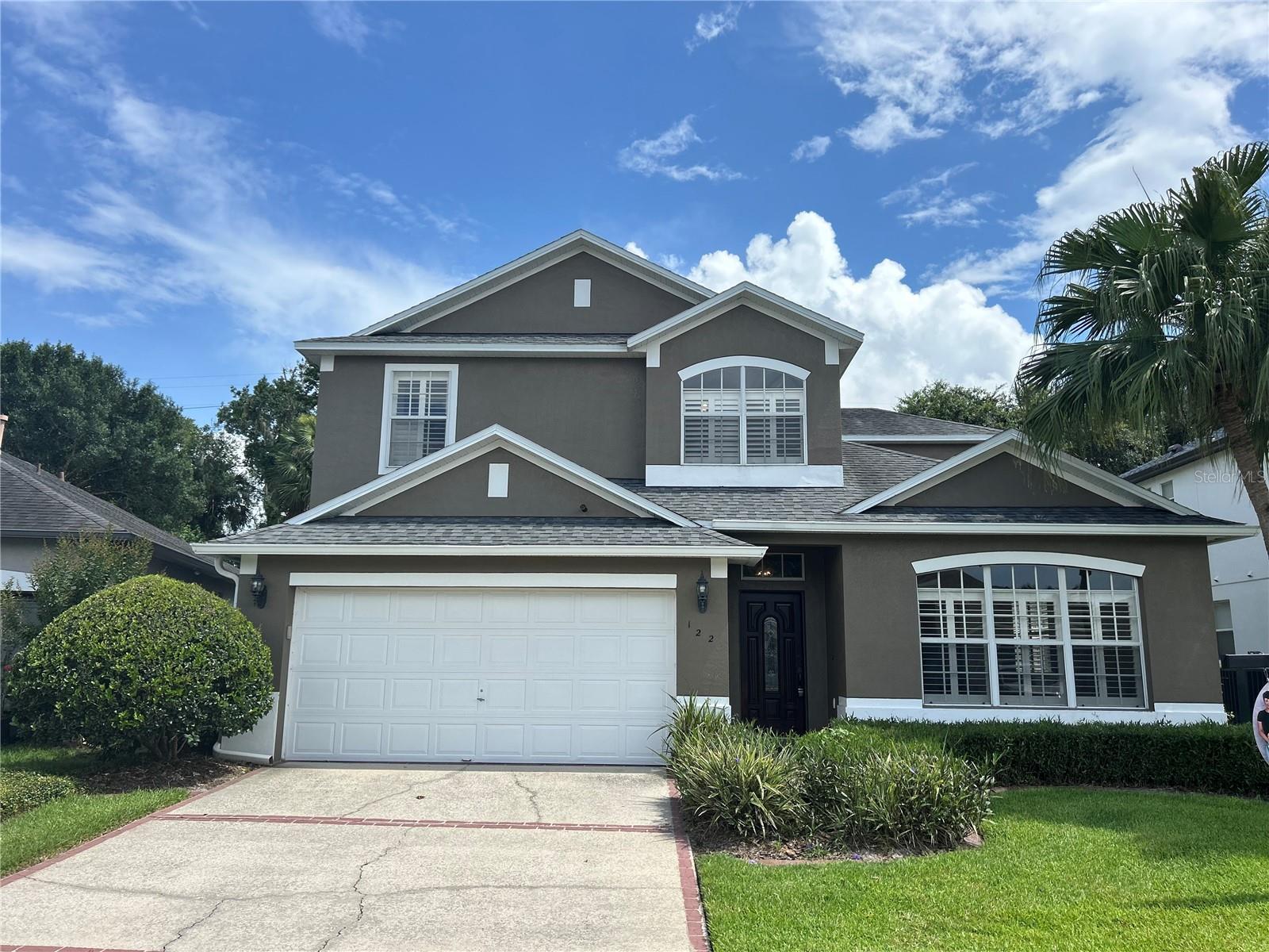 This spacious 3 bedroom, 2.5 bathroom home, with 2 car garage, is located in the City of Winter Springs. This 2,100 square foot, 2-story home features a hard wood staircase with lovely cast iron railing. The home has dark wood flooring and tile through the living areas. The kitchen has plenty of cabinetry space and granite counter tops with a breakfast bar and stainless steal appliances, including a dishwasher, microwave, refrigerator and a gas-stove top oven. Off to the side of the kitchen is a sliding glass door leading to the brick-paved patio, overseeing the large back yard. The primary bath has dual sinks with granite counter tops, a large walk in shower and a separate garden tub. Excellent shopping is near by in the Winter Springs Town center. Quick commutes to all of Central Florida to make commuting to anywhere in the Orlando area an easy drive. Lawn care is included in the rental amount!