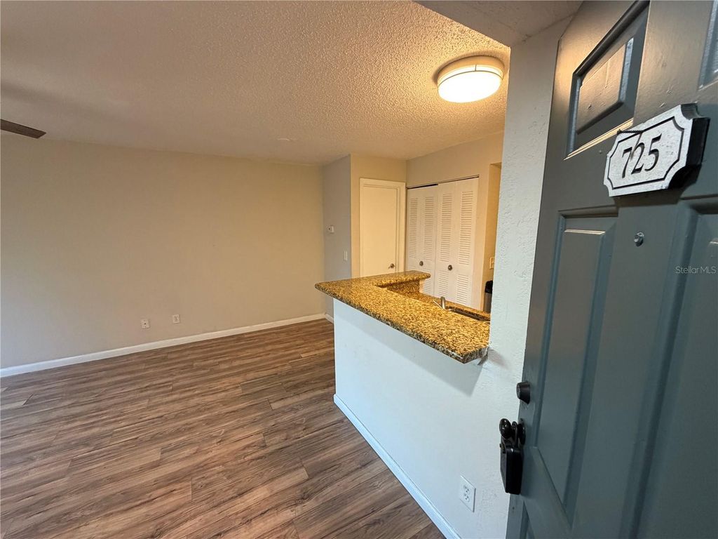 Photo of 5128 Conroy Road #725, Orlando, FL 32811 (MLS # O6410885)