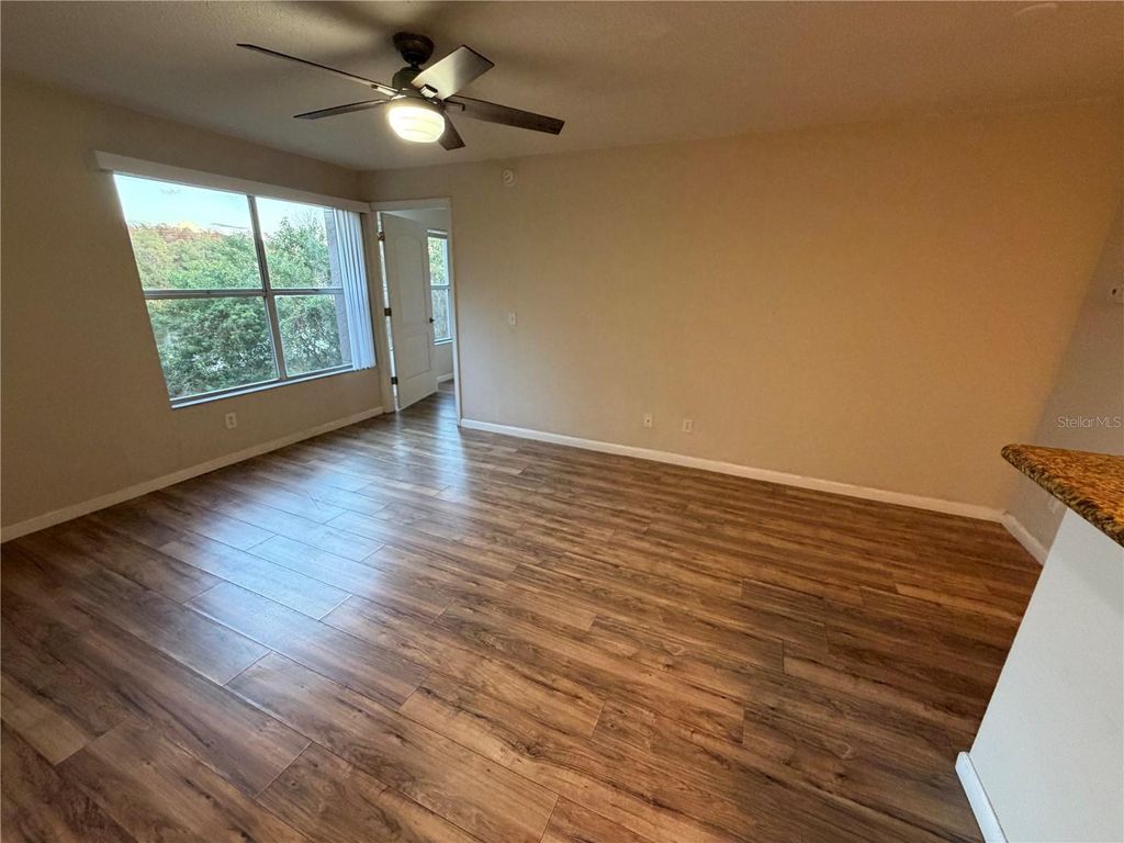 Photo of 5128 Conroy Road #725, Orlando, FL 32811 (MLS # O6410885)