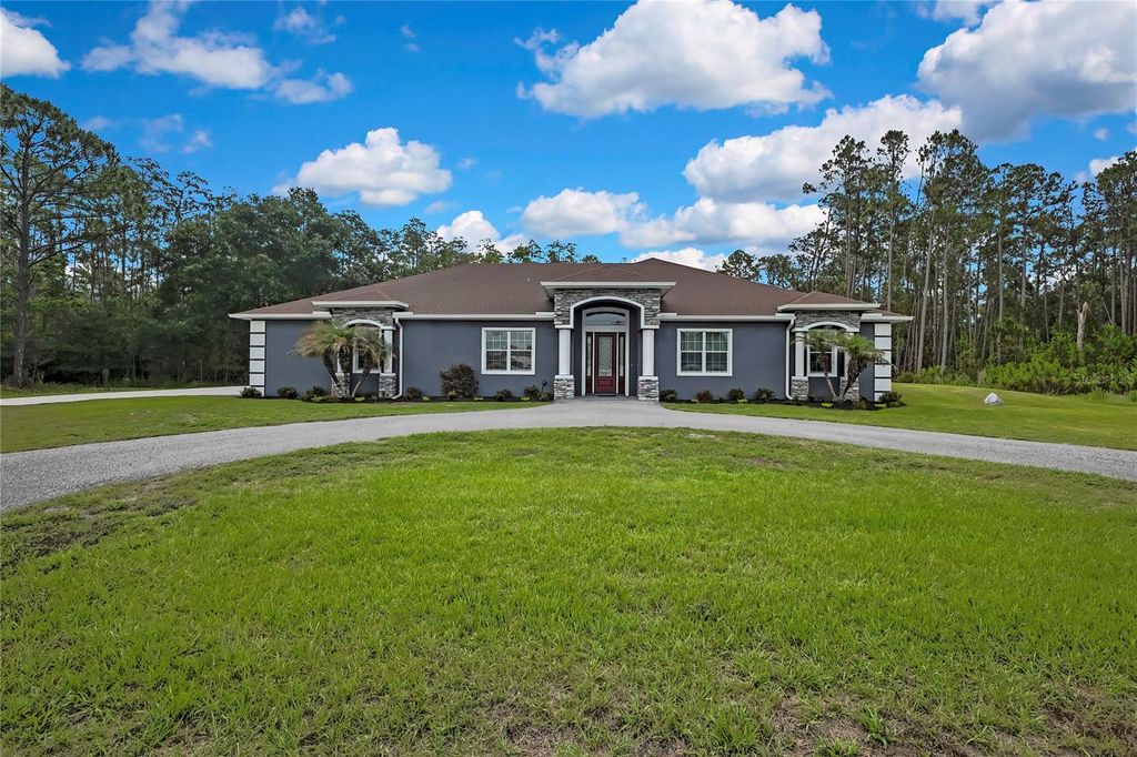 Photo of 27338 Elkwood Circle, Wesley Chapel, FL 33544 (MLS # TB8440817)