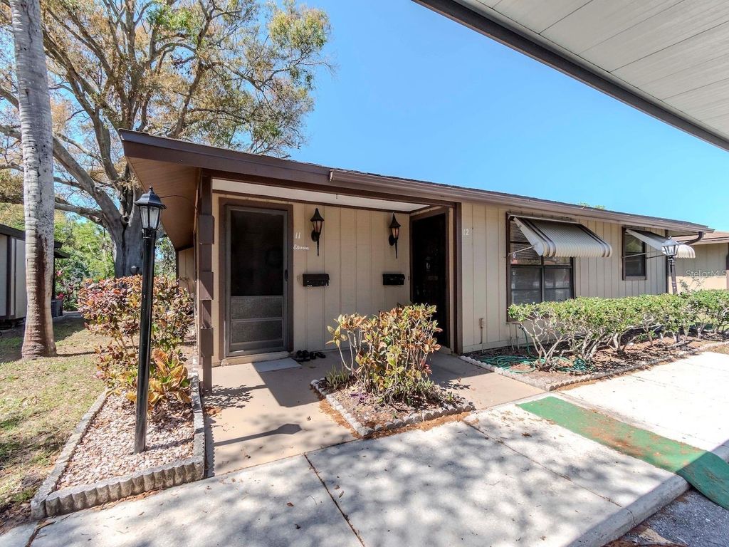 Photo of 1980 Tahitian Place #12, Dunedin, FL 34698 (MLS # TB8411581)