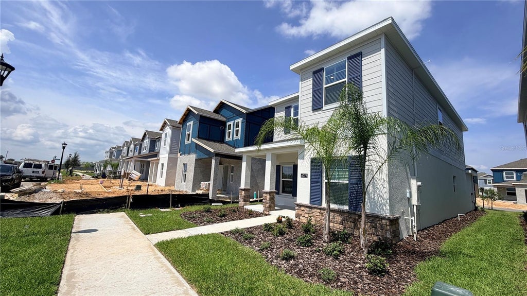 Photo of 6079 Wellbeing Way, Clermont, FL 34714 (MLS # O6425209)