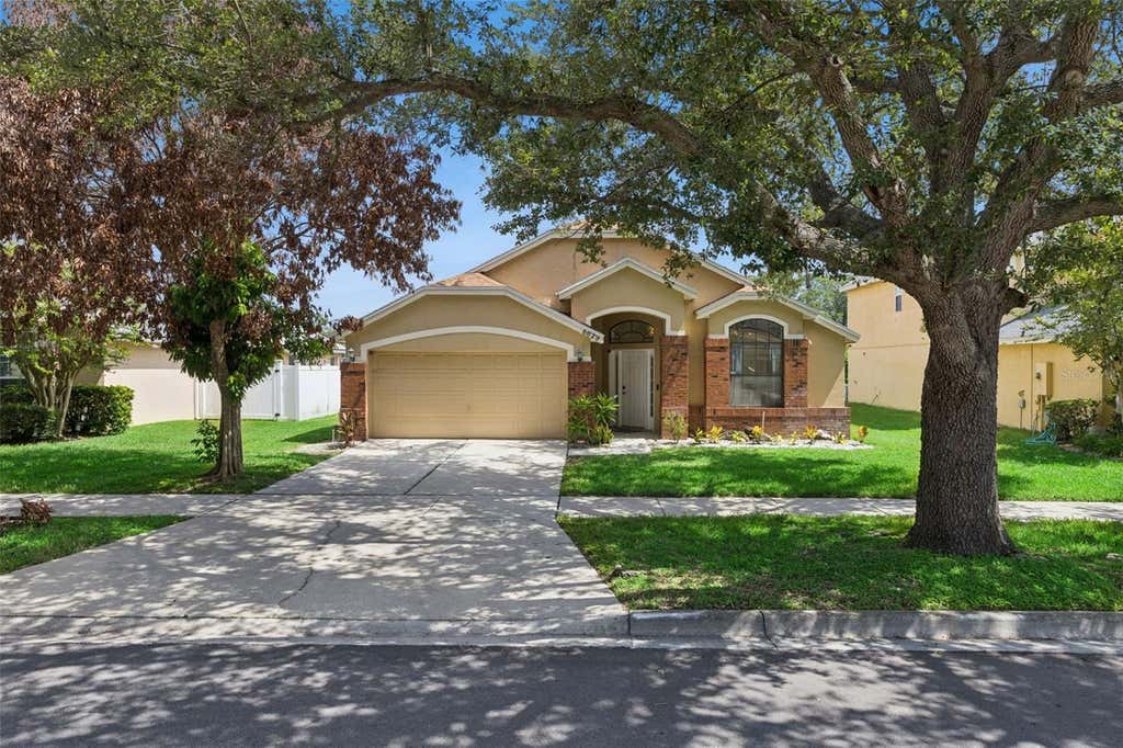 Photo of 6629 Winder Oaks Boulevard, Orlando, FL 32819 (MLS # O6426762)