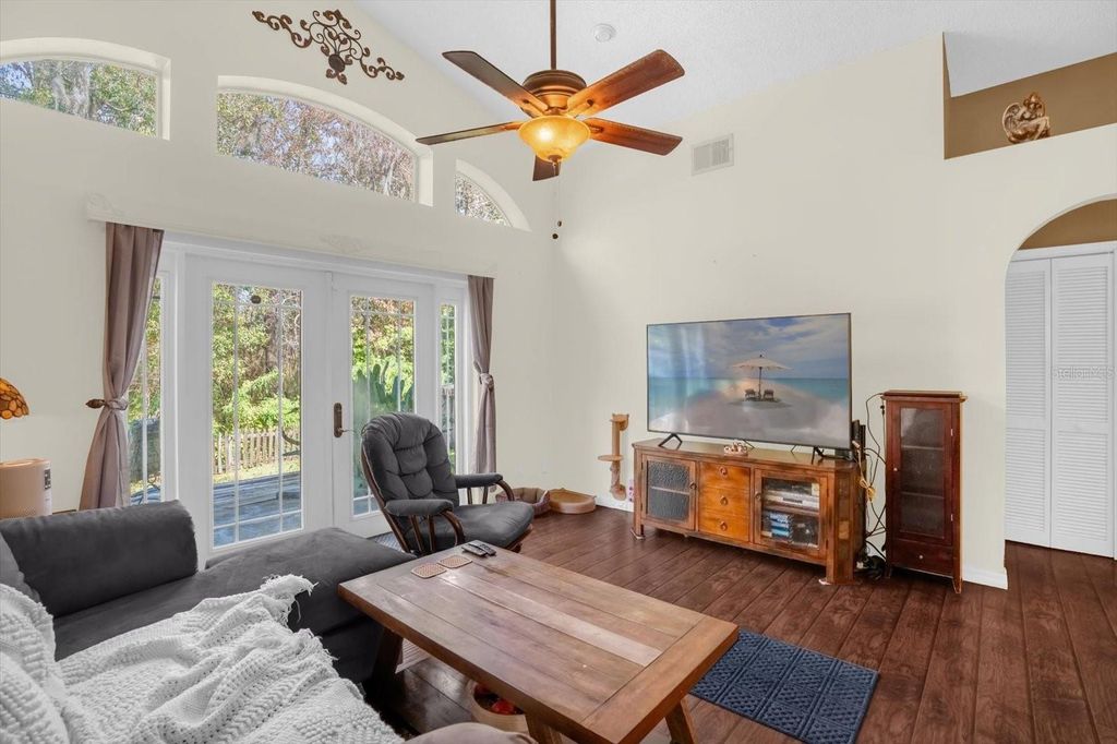 Photo of 10303 Winding Creek Lane, Orlando, FL 32825 (MLS # O6372632)