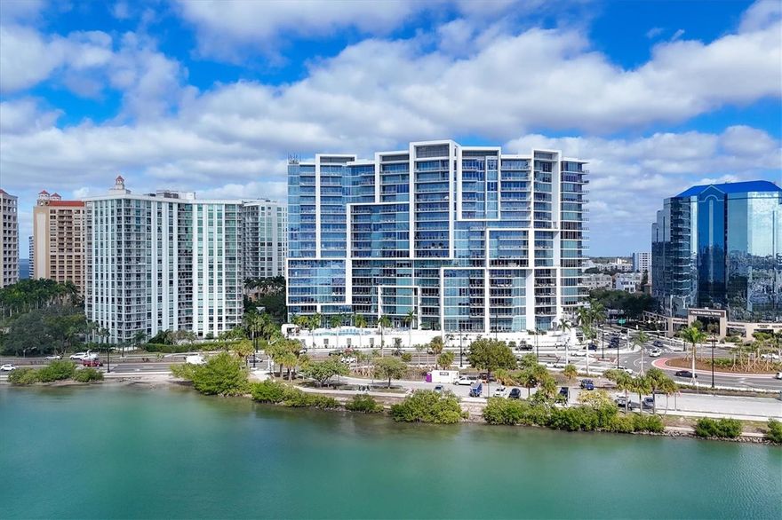 Prepare to be captivated by this magnificent 3-bedroom 3 bath property that offers the ultimate living experience. With breathtaking bay views that can be admired from your expansive 48' balcony, you'll feel like you're living in a paradise retreat. Step into the well-appointed kitchen, equipped with top-of-the-line Jenn-Aire appliances and a beautiful modern backsplash. Each bedroom is adorned with custom-made power-assisted blinds, allowing you to effortlessly set the perfect ambiance. The primary bedroom not only boasts the same spectacular bay views but also features his and hers walk-in closets for added convenience. And let's not forget the indulgence of a private elevator that opens up to your very own foyer, ensuring privacy and exclusivity. Location-wise, you couldn't ask for more. Situated a close distance of downtown Sarasota, O'Leary's, The Bay, and Bayfront Park, you'll have easy access to a vibrant social scene. Imagine strolling across the courtyard to the Westin for drinks and hors d'oeuvres at the rooftop bar. Additionally, you'll be just minutes away from St Armand's Circle, Lido Beach, the Van Wezel, Ringling Museum, Asolo, Sarasota Opera House, Selby Gardens, and even the Sarasota Airport. Truly, this property offers the quintessential "location, location, location" advantage. As for the building itself, rest assured that your safety and convenience are top priorities. With 24-hour security, concierge service, and valet parking, you'll have peace of mind knowing that every aspect of your comfort is taken care of. Plus, your 2 parking spots are conveniently located just steps away from your private elevator. Stay active and fit with the well-equipped gym and indulge in relaxation at the pool and jacuzzi. The beautiful club room is the perfect gathering place for neighbors to celebrate holidays and special events, fostering a strong sense of community. And last but not least, the exceptional staff at Vue are always on hand to ensure your needs are met. Opportunities like this are rare, as units at the Vue Sarasota Bay are highly sought after. Don't miss out on the chance to make this exceptional property your own. Act now and embrace the lifestyle you've always dreamed of. Room Feature: Linen Closet In Bath (Primary Bedroom).