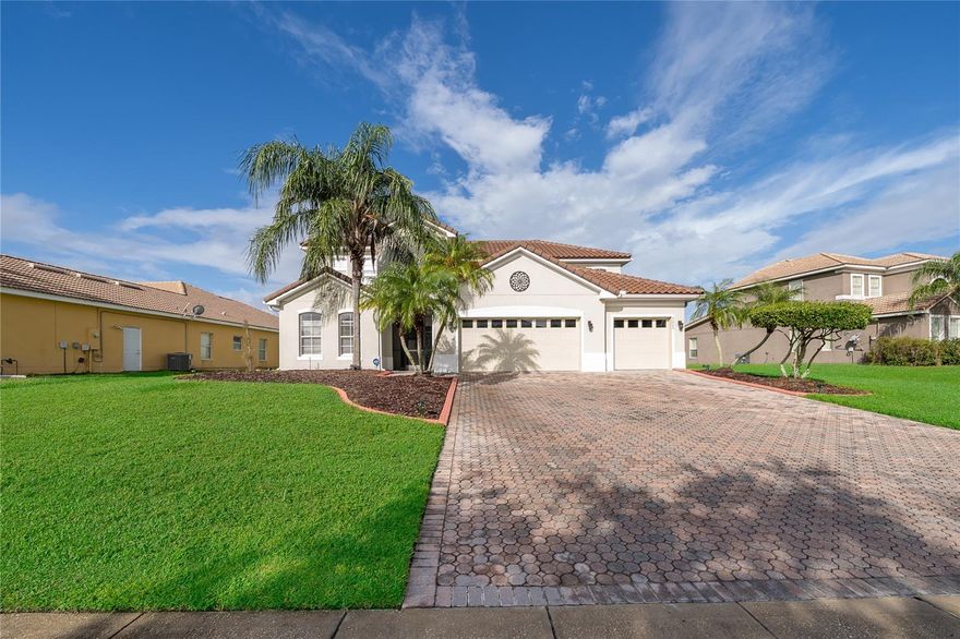 Are you looking for the perfect family home in a prime location? Look no further welcome home!
This stunning 3,600-square-foot residence combines elegance and comfort with beautiful hardwood and tile floors throughout. The primary suite, located on the main floor, offers serene lake views and a luxurious ensuite with double vanities topped with marble, a soaking tub, and a separate shower. Also on the main floor, you'll find an additional bedroom with its own full bathroom perfect for guests or multigenerational living.
Upstairs, there's plenty of space for everyone. A spacious loft with wood floors offers an additional living area. You'll also find four generously sized bedrooms, each with large closets, along with two well-appointed bathrooms to ensure comfort and privacy for both family and guests.
The kitchen is a true showstopper with granite countertops, with brand-new appliances.
Additional this home includes a newer roof, hot water heater, and AC system, as well as a three-car garage and an extended covered lanai perfect for entertaining where you can relax and enjoy breathtaking lake views and vibrant sunsets.