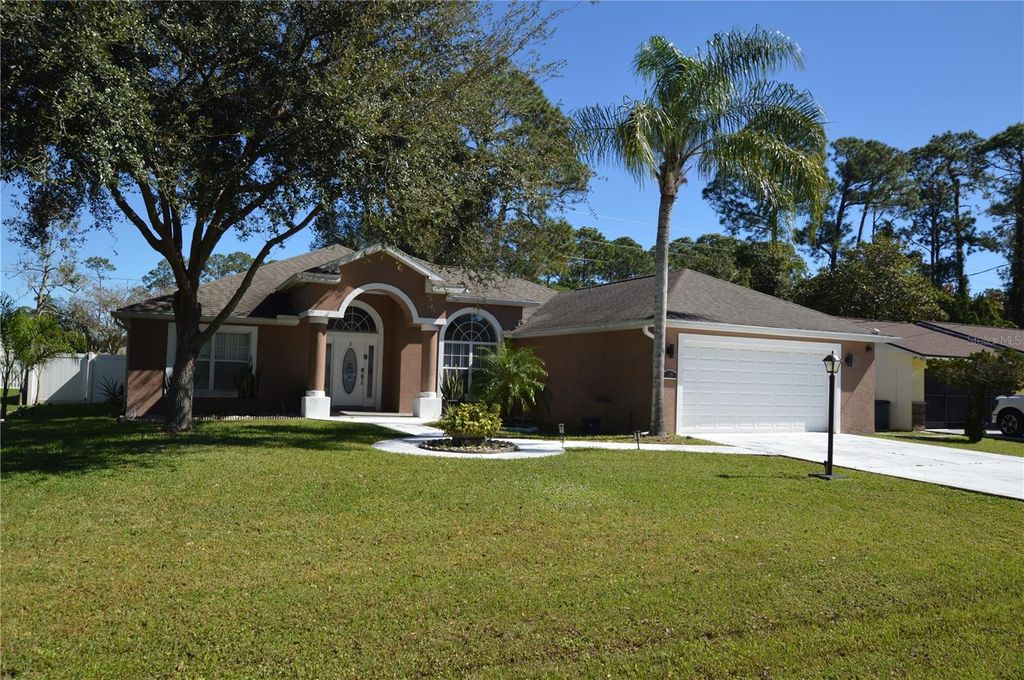 Photo of 18 Bradmore Lane, Palm Coast, FL 32137 (MLS # FC313777)
